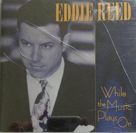 CD - Eddie Reed - While The Music Plays On
