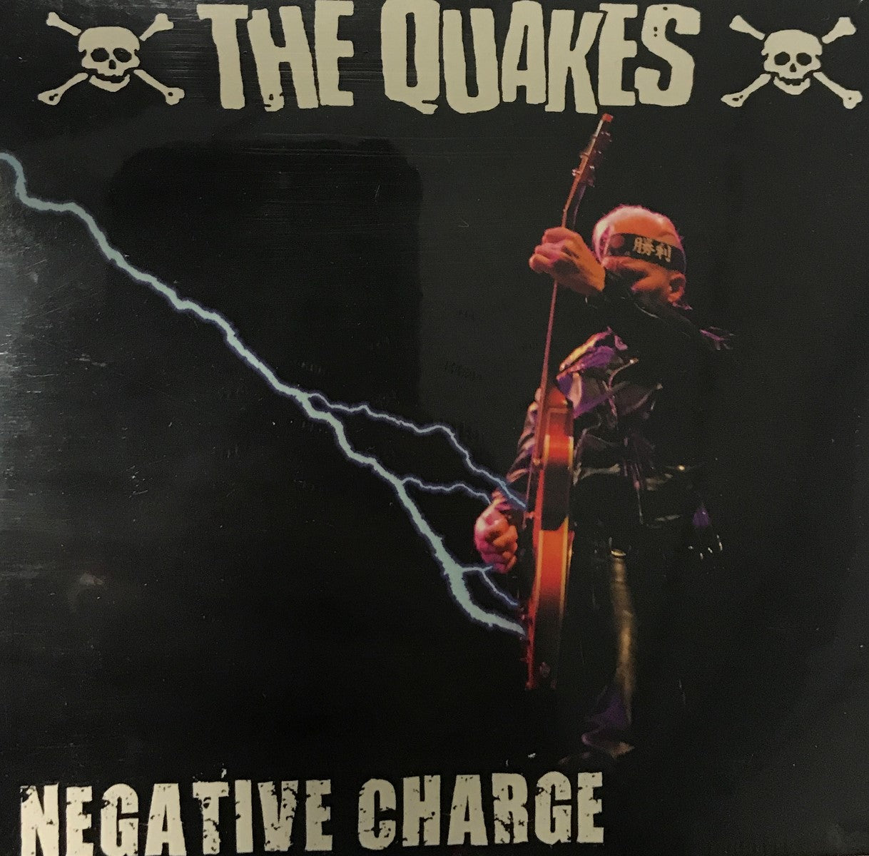 CD - Quakes - Negative Charge